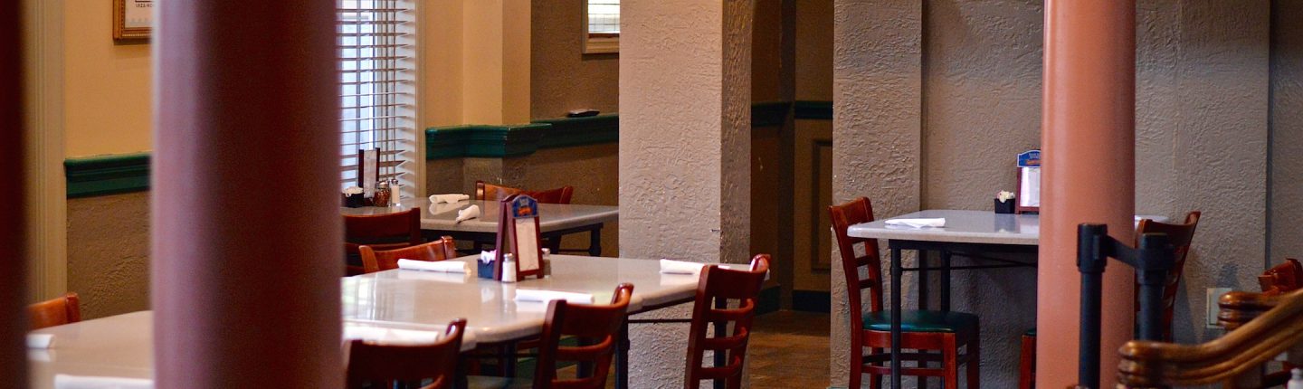 Interior of Zia Maria Italian Restaurant with Pillars, Chairs and Tables