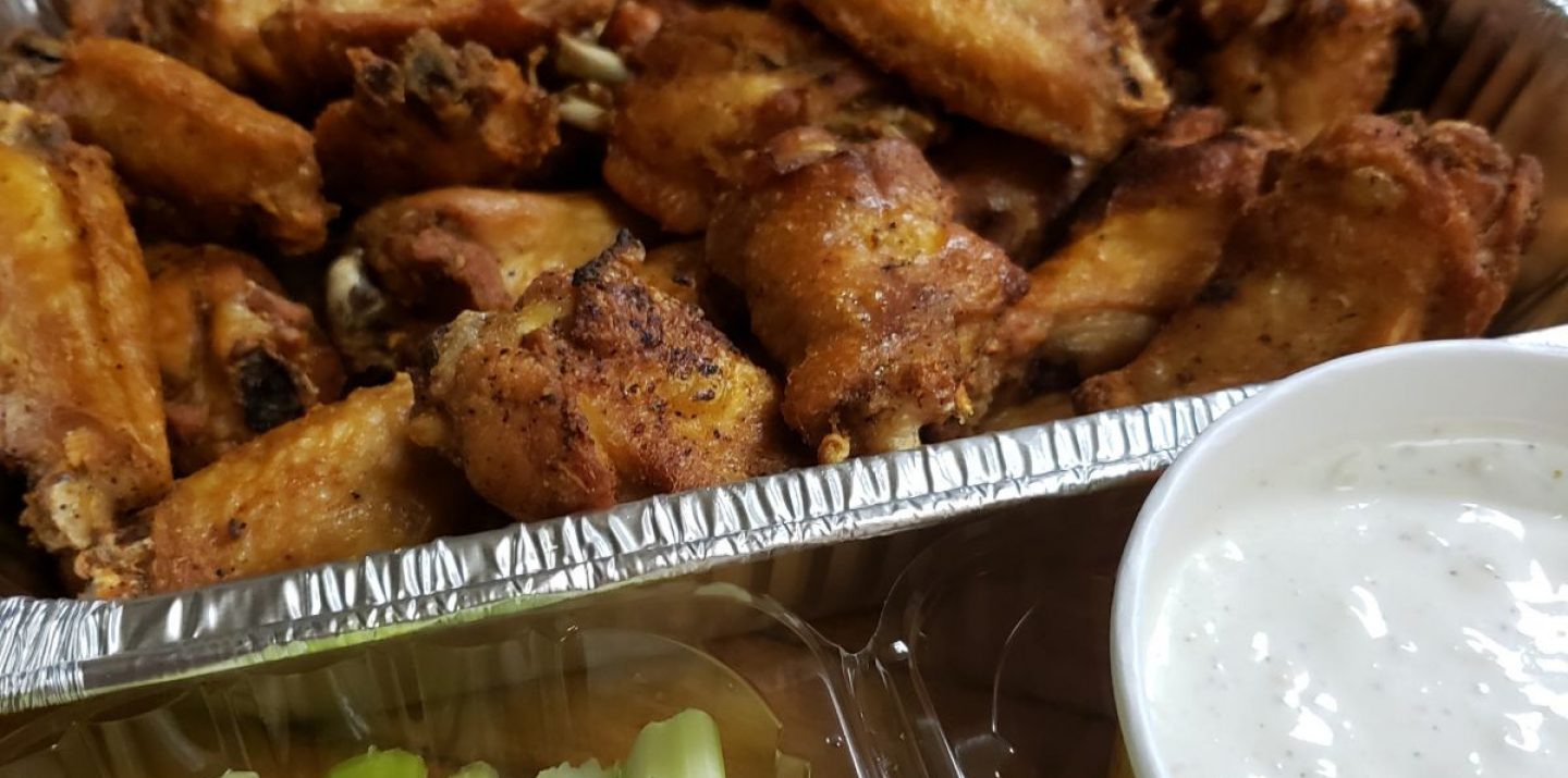 3 dozen bone in wings with bleu cheese and celery and coleslaw