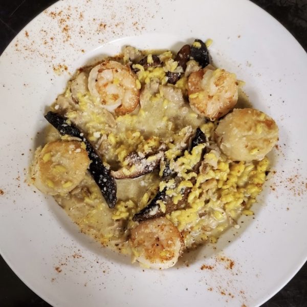 sautéed shrimp, scallop, chopped clam, and mushroom in a creamy saffron risotto and tossed with romano